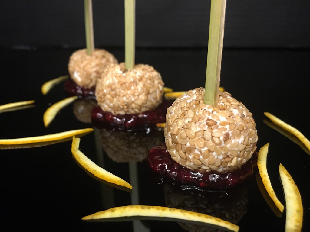 Goat cheese and sesame lollipops