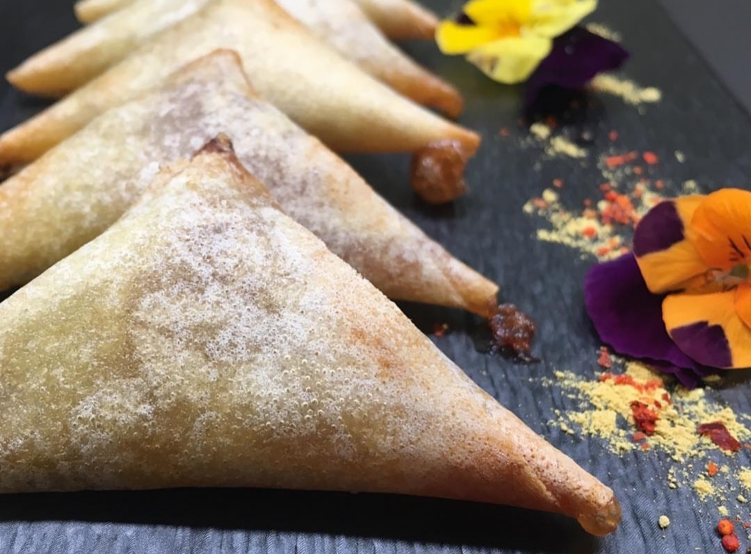 Foie gras and quince triangles